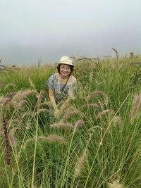 Portrait of young man on field