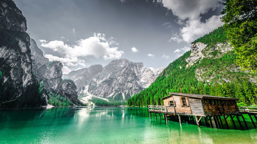 Scenic view of lago di braies and mountains against sky