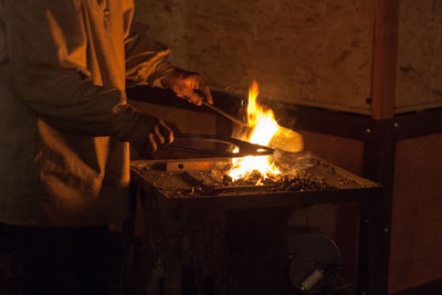 Close-up of man preparing food