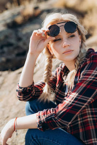 Young woman wearing sunglasses