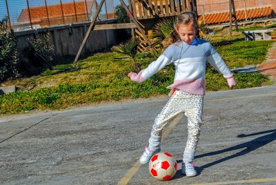 Girl playing with ball