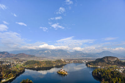 Scenic view of mountains against blue sky