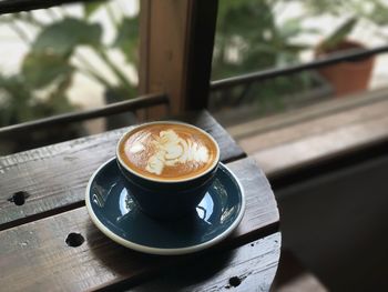Close-up of coffee cup on table