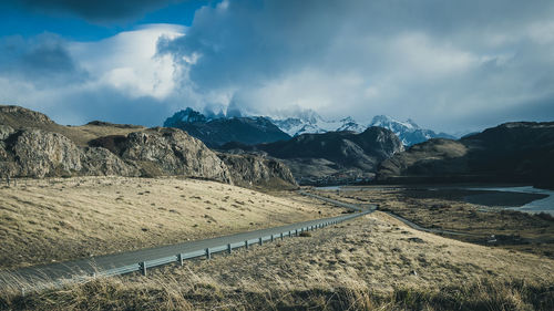 Panoramic view of snowcapped mountains against sky