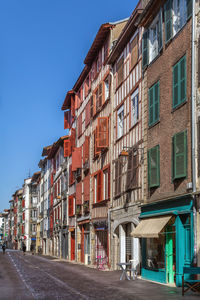 Street with historical houses in bayonne city center, france