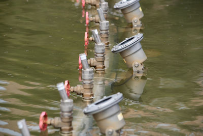 Engineering equipment of the fountain in close-up. a system of pipes and pumps for supplying 