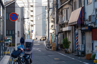 People walking on street in city