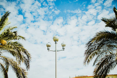 Low angle view of street light against sky