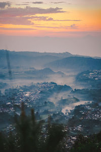 High angle view of landscape against sky during sunset