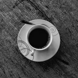 High angle view of coffee cup on table
