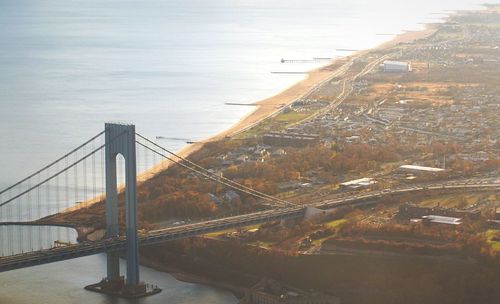 Aerial view of suspension bridge over sea