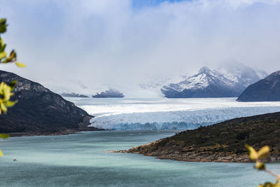 Scenic view of sea against sky during winter