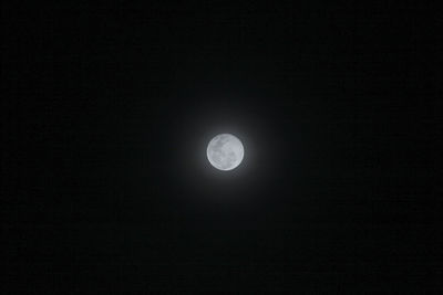 Low angle view of moon against sky at night