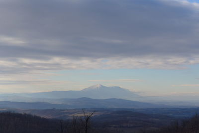 Scenic view of mountains against sky during sunset