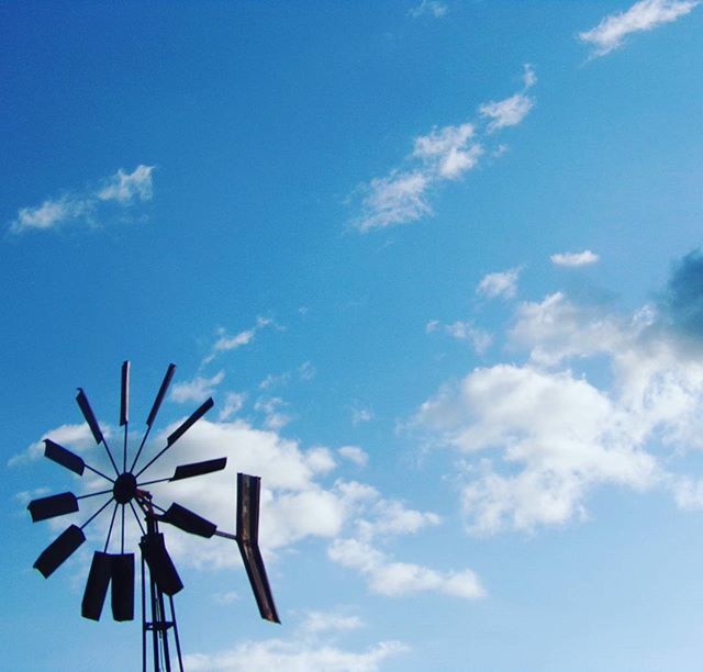 low angle view, sky, blue, cloud - sky, cloud, day, outdoors, no people, cloudy, nature, sunlight, tranquility, high section, white color, beauty in nature, part of, directly below, copy space, white, scenics