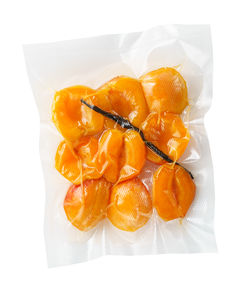 High angle view of orange fruit against white background