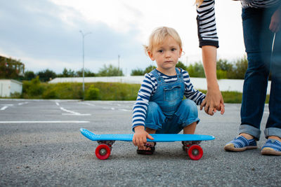 Boy and son on road