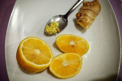 High angle view of fruits in plate on table