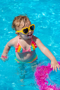 Woman swimming in pool