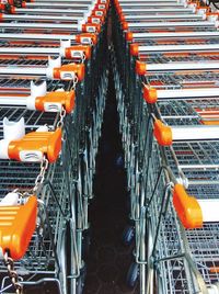 High angle view of shopping carts arranged in row