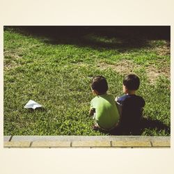 Woman standing on grass