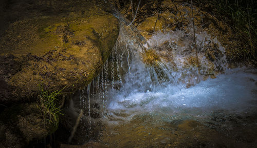 River flowing through rocks