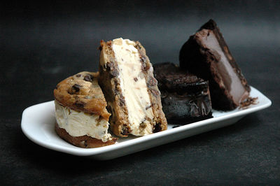Close-up of ice cream cookie sandwiches in plate on table