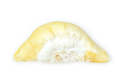 Close-up of bread on white background