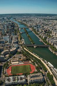 Buildings skyline and river seine seen from the eiffel tower in paris. the famous capital of france.