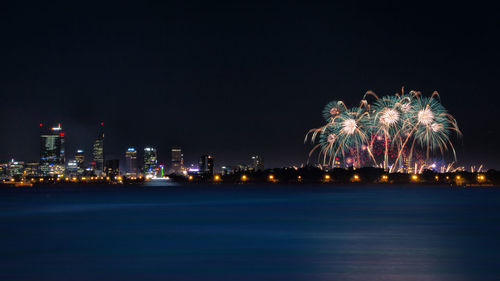 Firework display at night