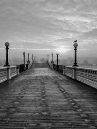 View of bridge against cloudy sky