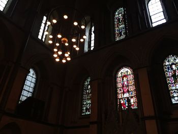 Low angle view of glass window in building