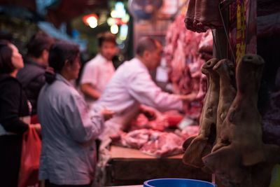 People at market stall