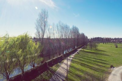 Panoramic view of agricultural field against sky