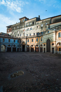 Buildings in city against sky