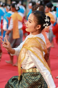 Close-up of girl standing outdoors