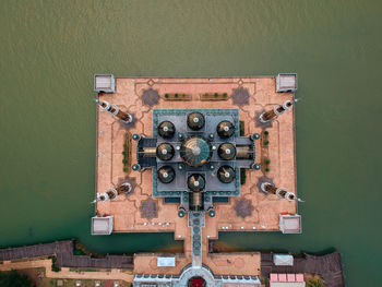 Aerial view of mosque over lake