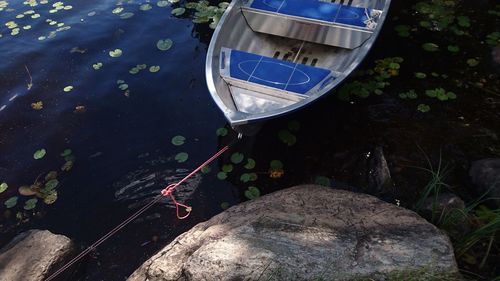 High angle view of boat moored in river