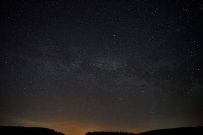 Low angle view of stars against sky at night