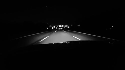 Cars on road at night