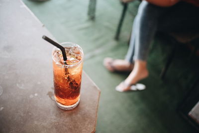 Close-up of ice cream on glass table