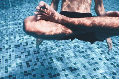 Cropped image of person in water