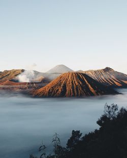 Scenic view of volcanic mountain against sky