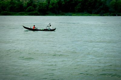 Man on boat in water