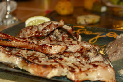 Close-up of meat in plate on table