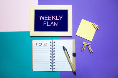 Information sign on table against blue background