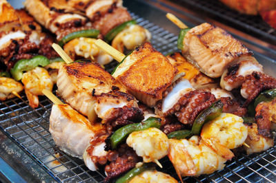 Close-up of seafood on barbecue grill