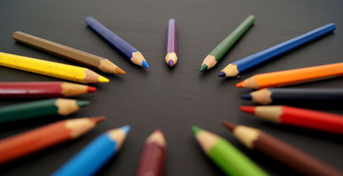 High angle view of colored pencils on table