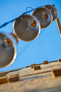 Low angle view of lamp against sky