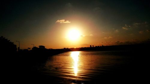 Scenic view of sea at sunset